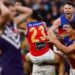 Brisbane Lions players celebrate winning the 2026 AFL Grand Final
