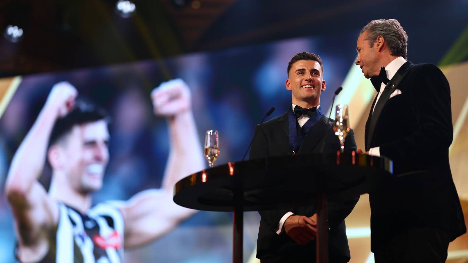 Nick Daicos speaks with Hamish McLachlan after winning the 2026 Brownlow Medal.