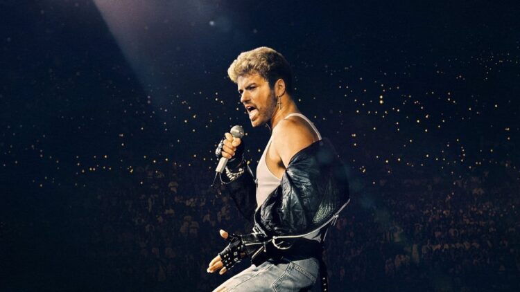 George Michael performing during The Faith Tour concert film.