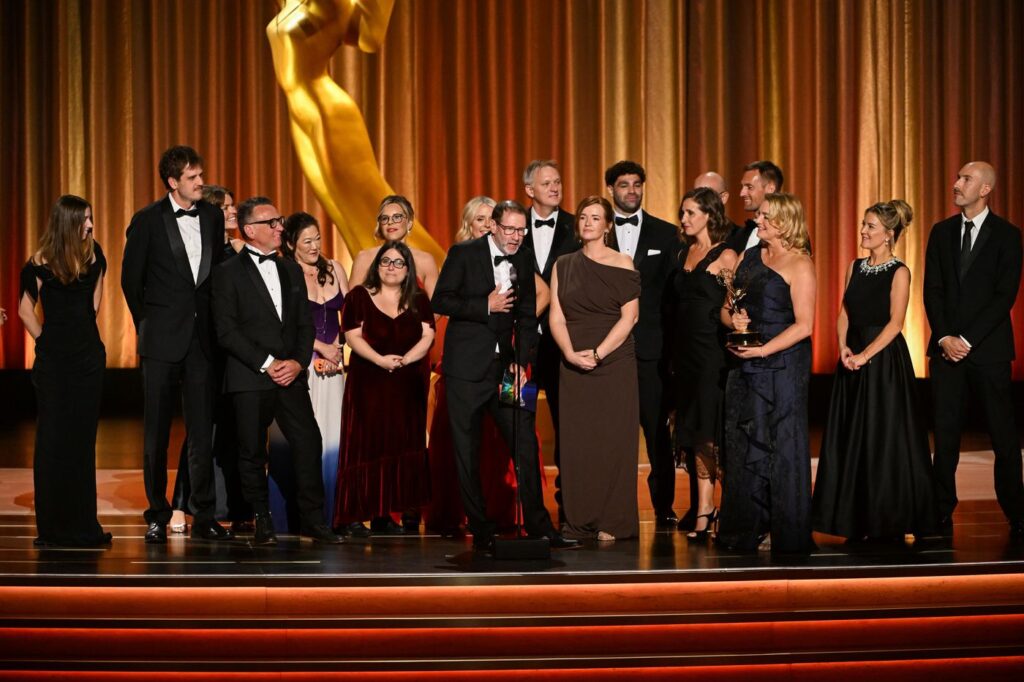 Love on the Spectrum team accepting a Primetime Emmy Award