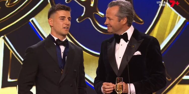 Nick Daicos speaks with Hamish McLachlan after winning the 2026 Brownlow Medal