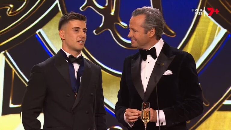 Nick Daicos speaks with Hamish McLachlan after winning the 2026 Brownlow Medal