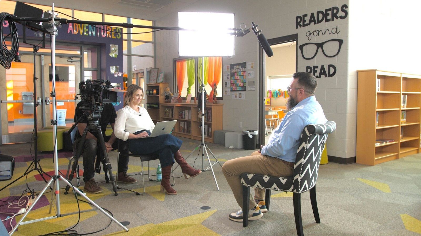 Shannon Harvey interviewing a participant for Raising Superheroes