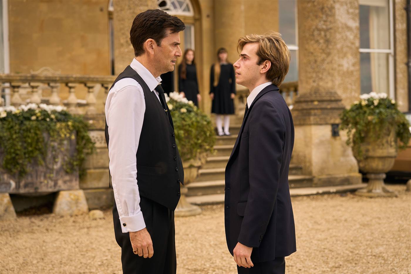 David Tennant as Tony Baddingham and Louis Landau as Archie Baddingham in Rivals Season 2