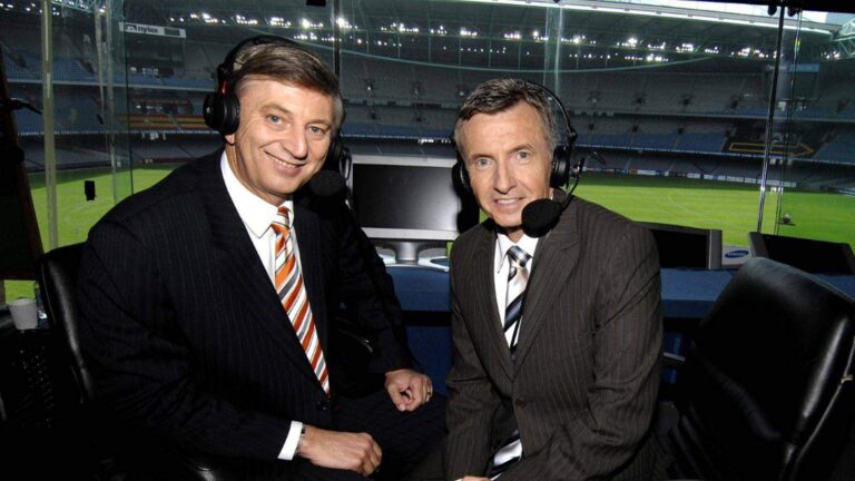 Dennis Cometti and Bruce McAvaney at an AFL commentary desk