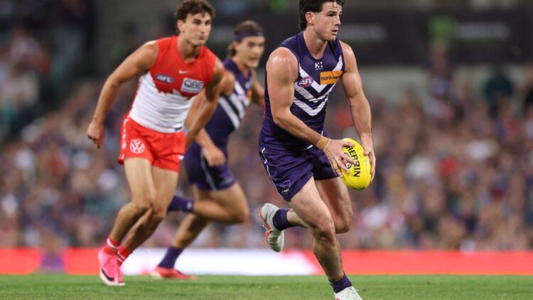 Fremantle Dockers player in possession against the Sydney Swans during the AFL finals