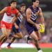 Fremantle Dockers player in possession against the Sydney Swans during the AFL finals