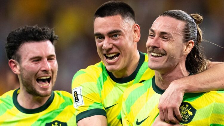 CommBank Socceroos players celebrate on the pitch