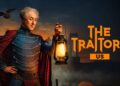 Alan Cumming holding a lantern in official artwork for The Traitors US on 10.