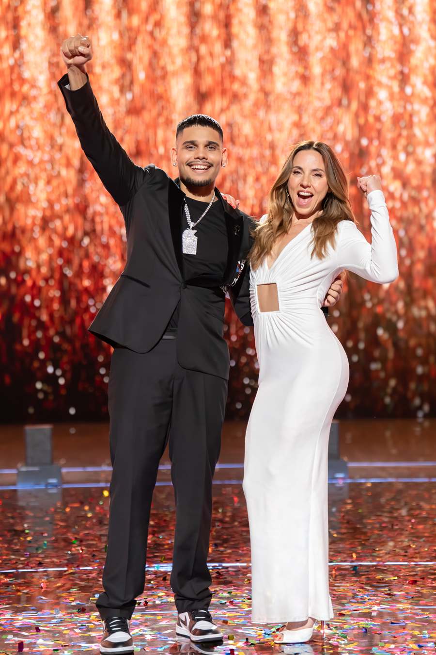 Yung Milla celebrates winning The Voice Australia with coach Melanie C