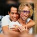 Roberto Meza Mont embraces Craig Ruddy in a publicity photograph for A Portrait of Love