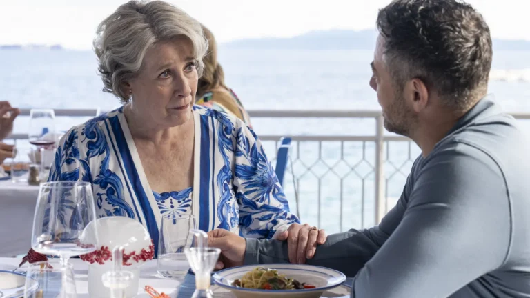 Joe Mottram speaks with Elena at an Italian seaside restaurant