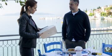 Lara Sarrancino and Joe Mottram on a waterfront terrace in A Taste For Murder on Channel 7