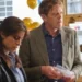 Two Beyond Paradise characters examine evidence