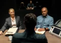 Detectives question a suspect in an interview room in Dustfall on ABC