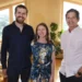 The host with homeowners in a sunlit room in Grand Designs New Zealand on ABC
