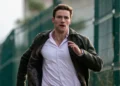 A man runs along a fence in Lynley on ABC
