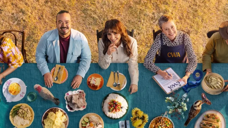 Recipe of the Year hosts and judges seated at a table of dishes on ABC