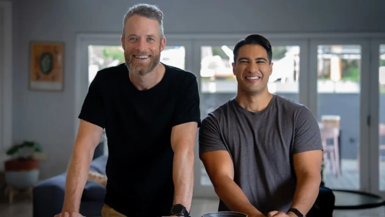 Two men stand in a living room in The State of Man on ABC