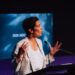 Speaker addresses the 2026 AIDC conference at a lectern