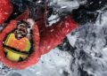 Climber in red winter gear on an icy slope in The Last First: Winter K2 publicity image