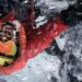 Climber in red winter gear on an icy slope in The Last First: Winter K2 publicity image