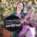 Pamela Buchanan holding her Great Australian Bake Off winner trophy and flowers