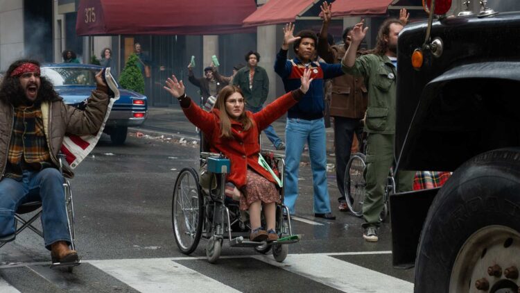 Ruth Madeley as Judy Heumann leads fellow protesters in Being Heumann