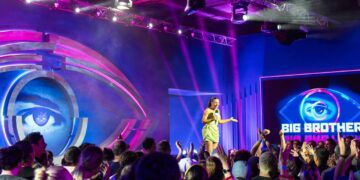 Big Brother host Mel Tracina on stage at the Big Brother 2026 launch