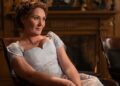 Ruth Gemmell as Lady Violet Bridgerton seated in Bridgerton