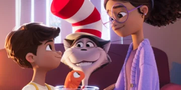 The Cat in the Hat smiles between Gabby and Sebastian in the animated film