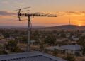 Illustrative television aerial overlooking a regional Australian town at sunset