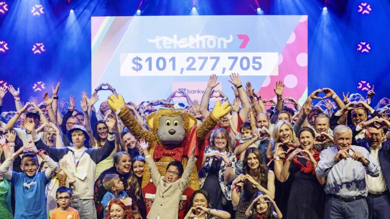Telethon children, stars and supporters celebrate on stage in front of the record $101,277,705 Channel 7 Telethon 2026 total