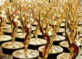 Rows of gold Emmy Award statuettes