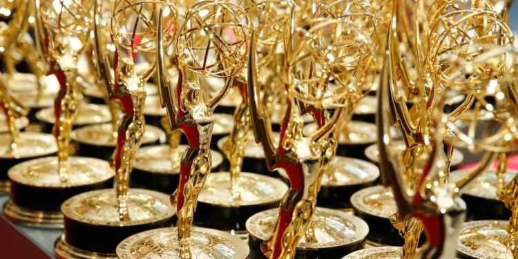 Rows of gold Emmy Award statuettes
