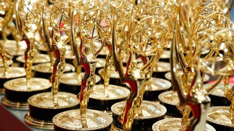Rows of gold Emmy Award statuettes
