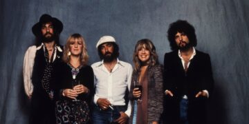 Fleetwood Mac members Mick Fleetwood, Christine McVie, John McVie, Stevie Nicks and Lindsey Buckingham in a classic band portrait