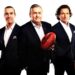 Eddie McGuire with fellow Footy Classified panellists holding Sherrin footballs