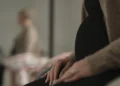 Pregnant woman pictured for Four Corners investigation The Pregnancy Penalty
