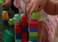 Child playing with blocks in Four Corners Monstrous