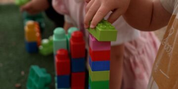 Child playing with blocks in Four Corners Monstrous