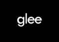 White Glee title card on a black background
