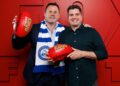 David King and Leigh Montagna hold Kayo Sports footballs ahead of the 2027 AFL season.