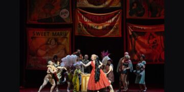 A colourful scene from the Metropolitan Opera production of Così fan tutte