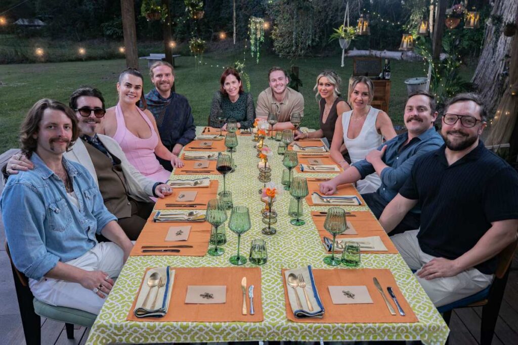 Gatecrasher and guest teams seated at the Instant Restaurant dinner table