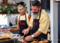 Jane and Shane prepare food together in the My Kitchen Rules kitchen