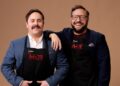 My Kitchen Rules contestants Angus and Simon in their MKR aprons