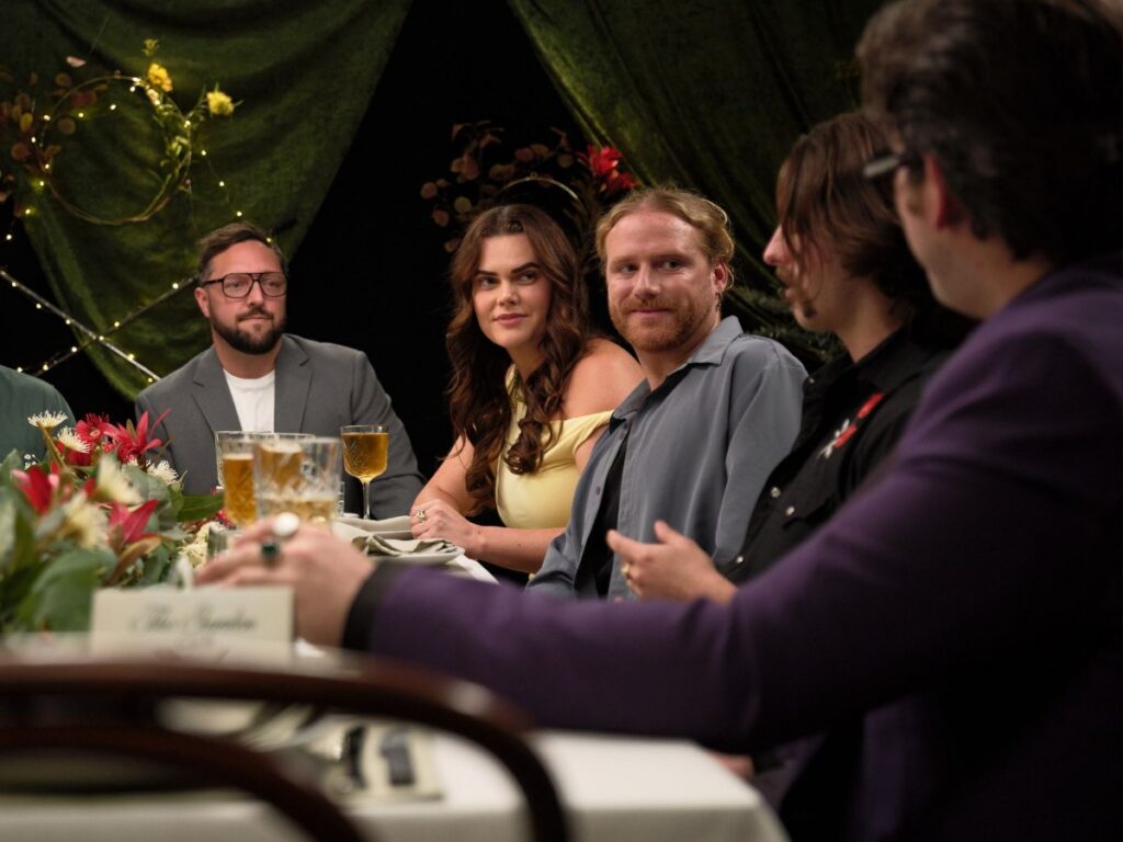 My Kitchen Rules teams seated at the dinner table at The Garden Club