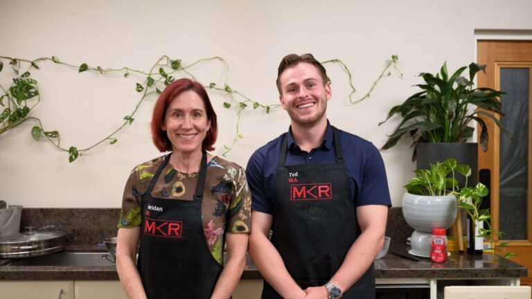 Sheridan and Ted in their MKR aprons in the kitchen of their Perth Instant Restaurant