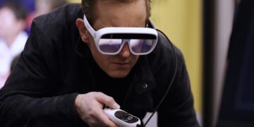 News24 National Affairs Correspondent Jonathan Lea wearing smart glasses in Artificial Intelligence: Who's in Control?
